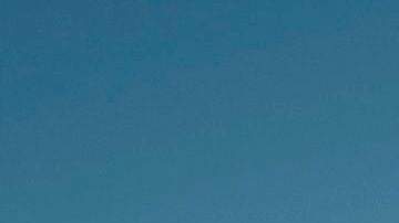 TOPSHOT - A young Mexican girl's hand is pictured on the between the metal fencing on the US-Mexico border in Anapra, New Mexico on March 19, 2019. - Speaking of an "invasion" of illegal immigrants and criminals, US President Donald Trump last week signed the first veto of his presidency, overriding congressional opposition to secure emergency funding to build a wall on the Mexican border, the signature policy of his administration. (Photo by Paul Ratje / AFP)        (Photo credit should read PAUL RATJE/AFP via Getty Images)
