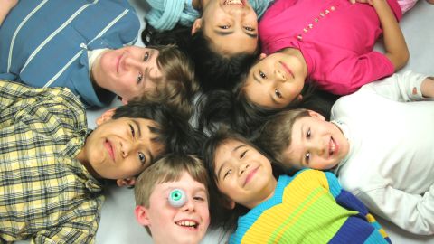 Seven,Children,Heads,In,Circle.