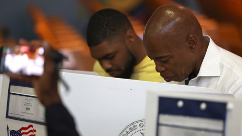 NEW YORK, NEW YORK - JUNE 22: New York City mayoral candidate Eric Adams votes during Primary Election Day at P.S. 81 on June 22, 2021 in the Bedford-Stuyvesant neighborhood of Brooklyn borough in New York City. Mayoral candidate and frontrunner Eric Adams voted in a crowded race where recent polls have him leading the pack in a bid to replace Mayor Bill de Blasio. This is the first year in the city for ranked-choice voting, which allows voters to rank their top five candidates. (Photo by Michael M. Santiago/Getty Images)
