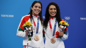 Orozco y Agúndez García se fueron satisfechas con su medalla colgada.