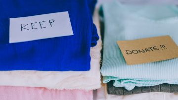 Decluttering,And,Tidying,Up,Concept:,Piles,Of,Tshirts,And,Clothes