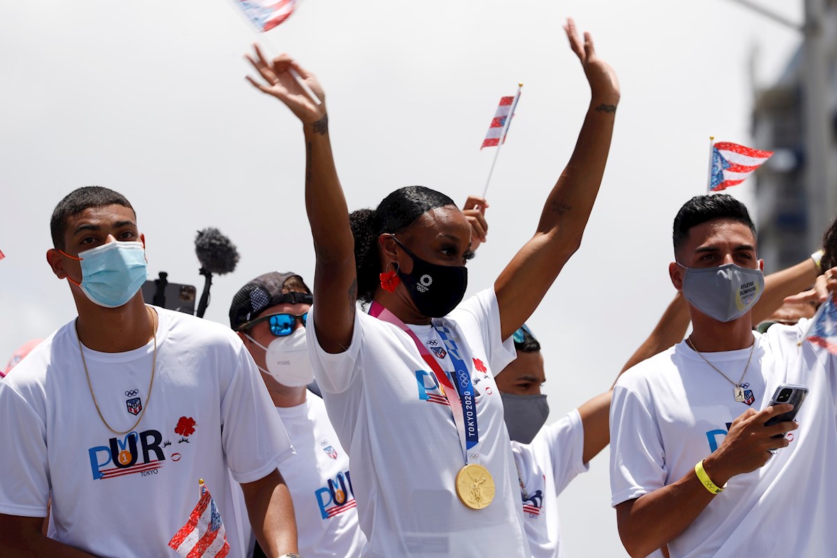 Athlete Camacho-Quinn arrived in Puerto Rico and led the caravan wearing his Olympic gold