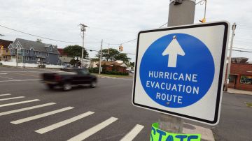 LONG BEACH, NEW YORK - AUGUST 21: A sign alerts drivers to the hurricane evacuation site as Hurricane Henri moves towards Long Island on August 21, 2021 in Long Beach, New York. A storm surge, hurricane conditions and flooding are expected along the northeastern coast of the United States beginning late Saturday night and into midday Sunday. (Photo by Bruce Bennett/Getty Images)