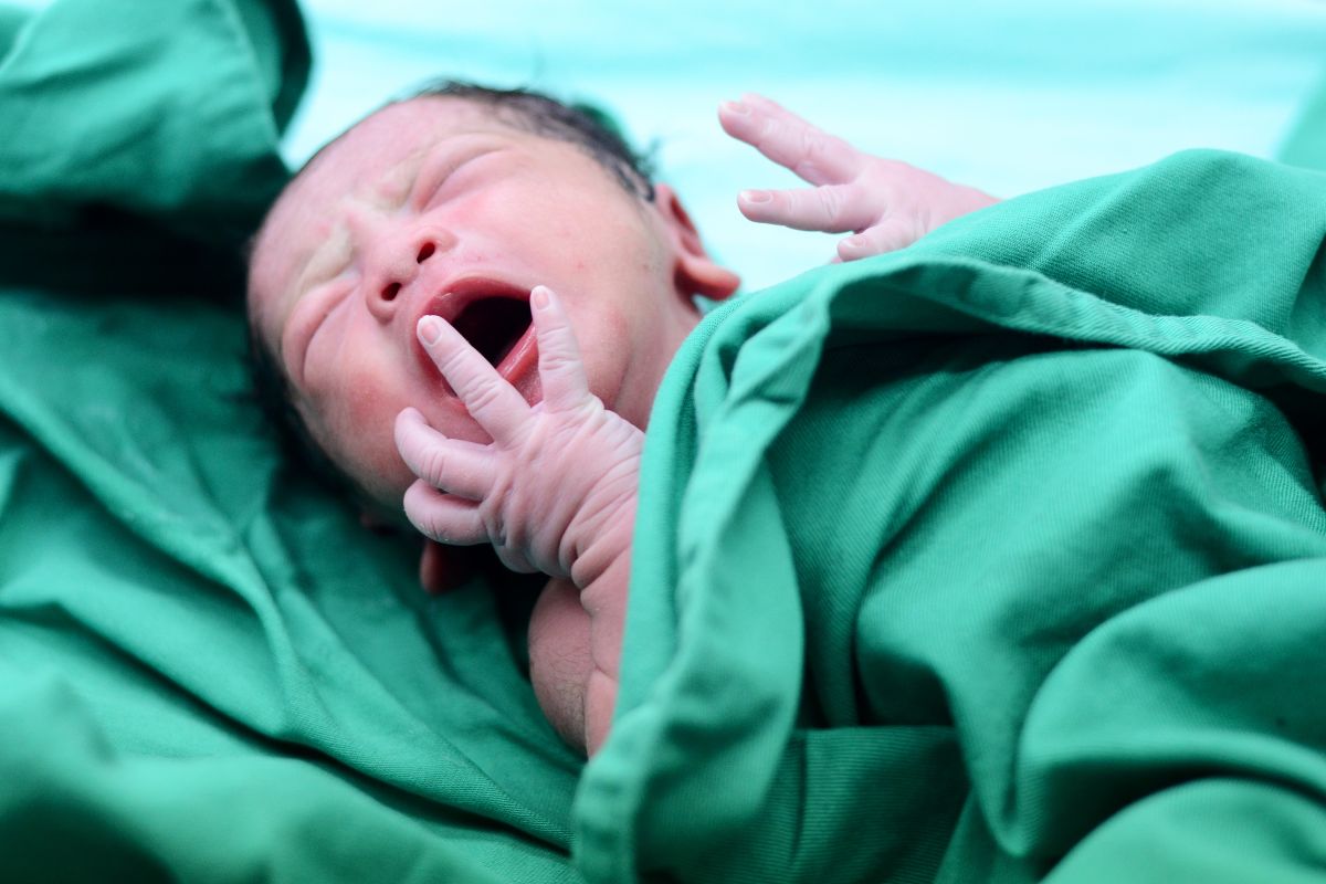 Baby is torn between life and death after doctors at the hospital where he was born dropped him