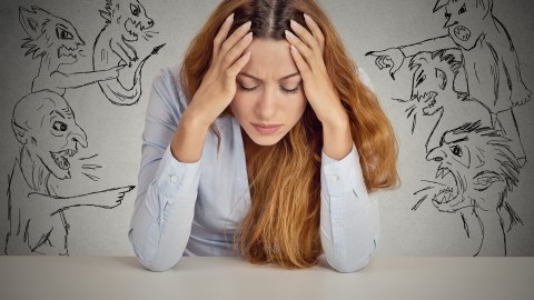 Evil,Men,Pointing,At,Stressed,Woman.,Desperate,Young,Businesswoman,Sitting