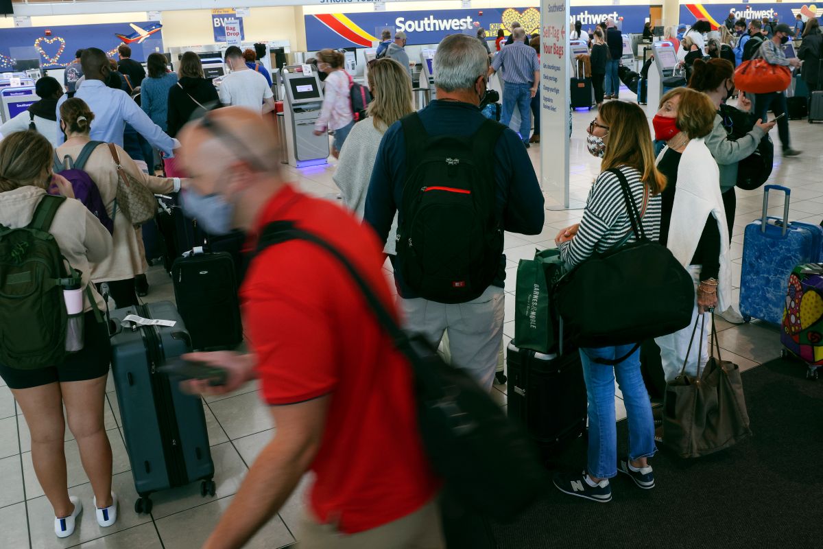 Southwest Airlines customers sleep on airport floors due to massive flight delays and cancellations since the weekend