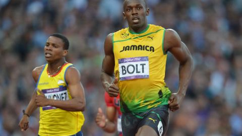 Álex Quiñónez y Usain Bolt