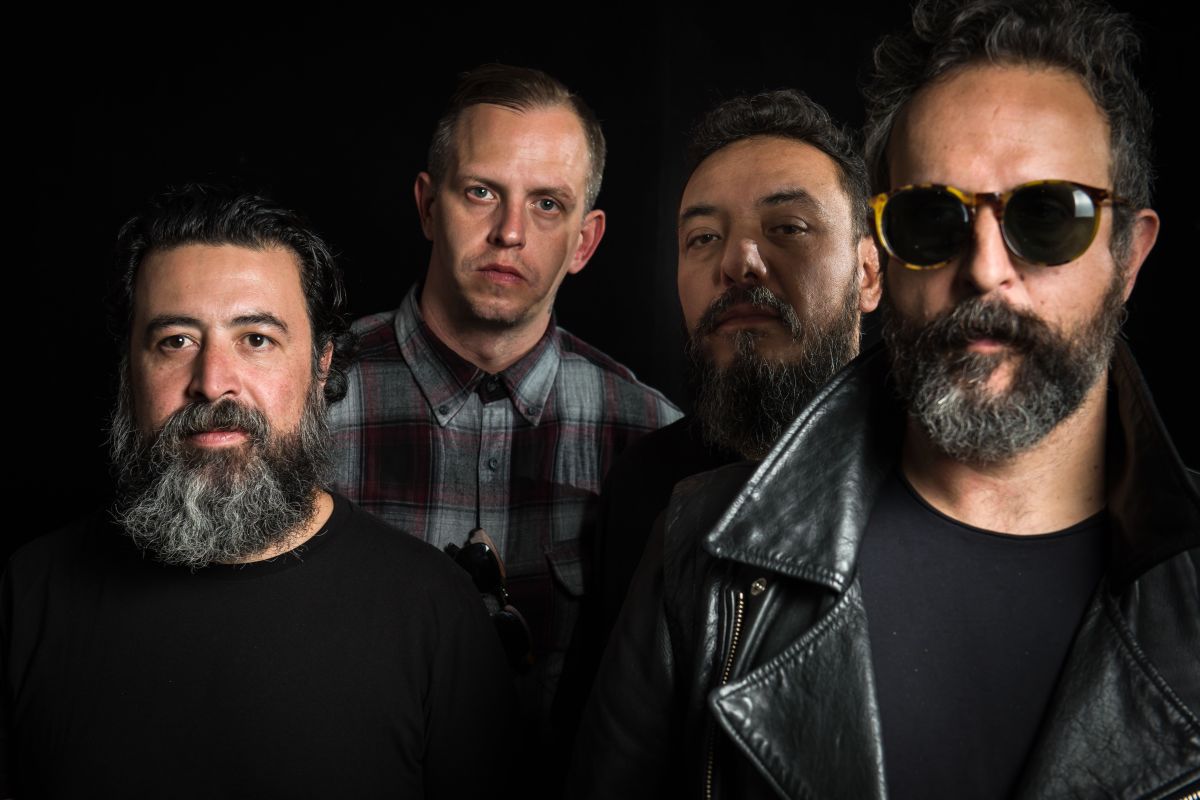 Micky Huidobro, Randy Ebright, Paco Ayala, and Tito Fuentes, members of the Mexican rock band Molotov, pose during a photoshoot in Mexico City on August 22, 2017.