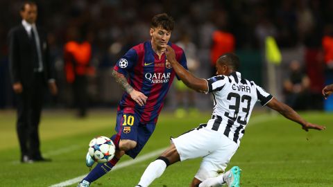 Lionel Messi y Patrice Evra