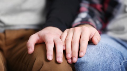 Two,Homosexuals,Holding,Each,Other,Hands,Closeup