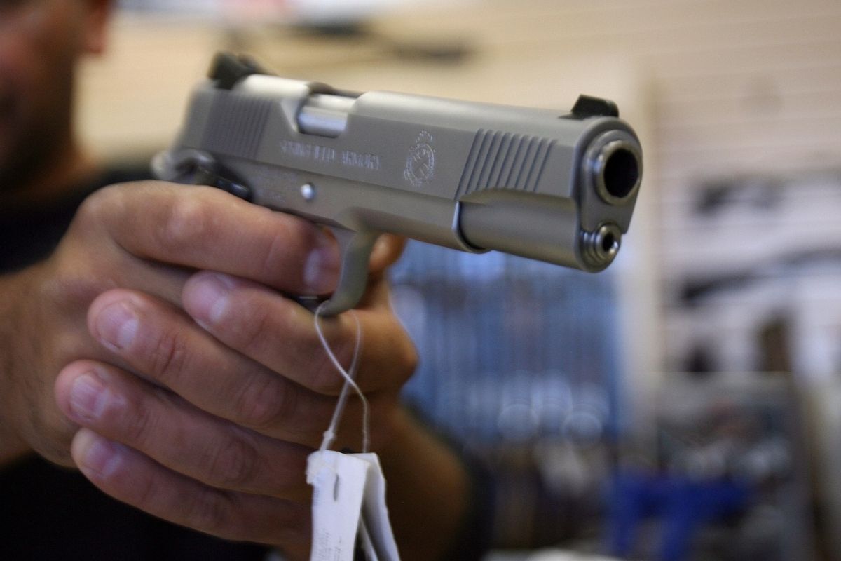 Gun store owner shoots employee in the face after botched prank
