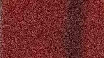 Un viajero espera en un puesto de inspección en el Aeropuerto Internacional Luis Muñoz Marín en Puerto Rico.