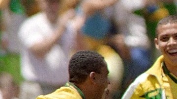 Brazilian forward Romario runs towards his teammat