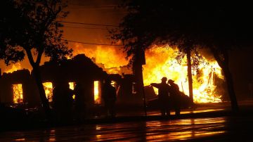 Firefighters battle a blaze in Galveston
