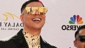 Grupo Firme y Harry Styles.