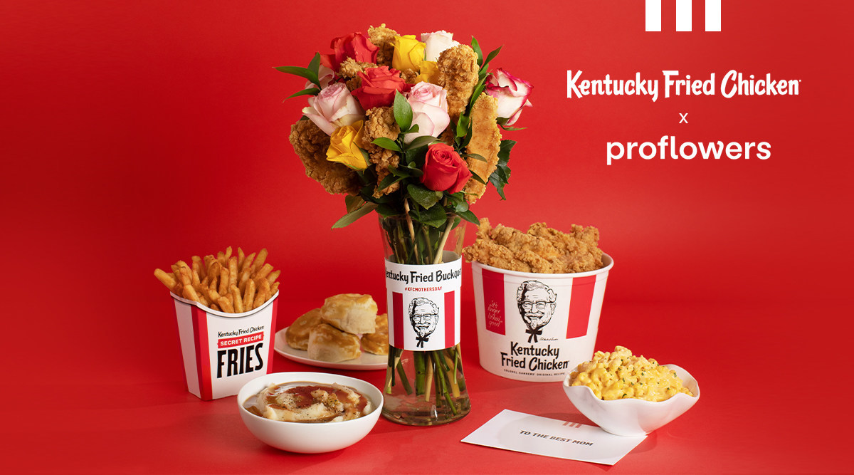 Kentucky Fried Buckquet includes 12 colorful roses, a glass vase, a KFC vase appliqué, eight skewers and a card.