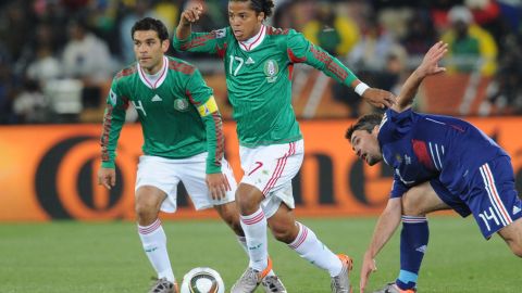 Giovani dos Santos junto a Rafa Márquez.