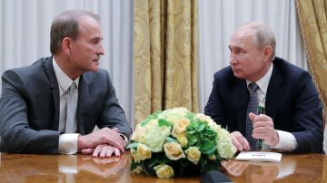 Viktor Medvedchuk y Vladimir Putin.