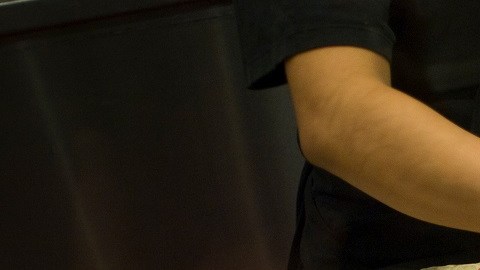 Empleados de Chipotle preparando burritos