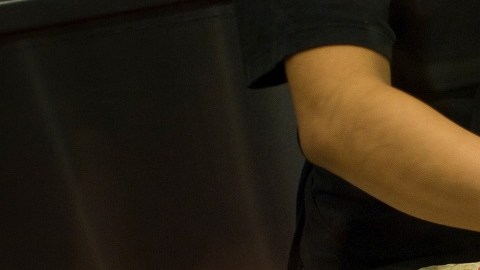 Empleados de Chipotle preparando burritos