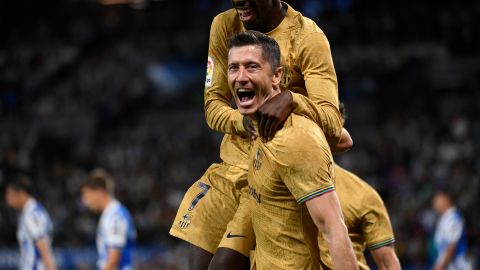 Ousmane Dembélé y Robert Lewandowski