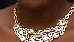 Meghan Markle, el Príncipe Harry y la reina Isabel II.