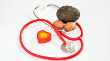 Stethoscope,And,Heart,Of,Wood,,Nuts,And,Avocado,On,White
