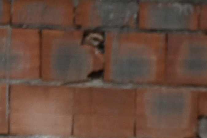 Residents remain among the rubble of destroyed houses washed away by a landslide during heavy rains in Las Tejerias, Aragua state, Venezuela, on October 9, 2022. - A landslide in central Venezuela left at least 22 people dead and more than 50 missing after heavy rains caused a river to overflow, Vice President Delcy Rodriguez said Sunday. (Photo by Yuri CORTEZ / AFP) (Photo by YURI CORTEZ/AFP via Getty Images)