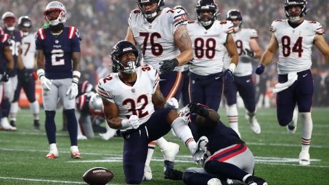 David Montgomery (#32) celebra su touchdown ante New England Patriots.