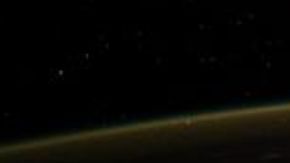 Fotografía del astronauta de las dos manchas de luz.