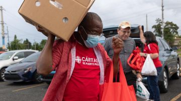 Voluntarios Caritas inmigrantes Puerto Rico