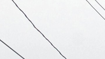 Una columna de humo después del choque entre un tren y un vehículo-tanque cargado con gasolina en Aguascalientes.