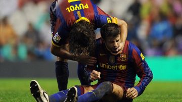 Puyol defendió la camiseta del FC Barcelona junto a Piqué.