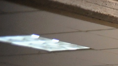 Colombian police officers escort Dairon