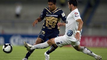 Pumas' footballer Javier Cortes vies for