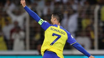 Nassr's Portuguese forward Cristiano Ronaldo celebrates scoring his team's fourth goal the Saudi Pro League football match between Al-Wehda and Al-Nassr at the King Abdulaziz Stadium in Mecca on February 9, 2023. (Photo by AFP) (Photo by -/AFP via Getty Images)