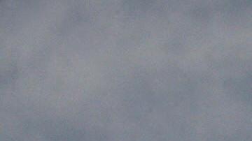 An Iranian soldier stands guard on a mou