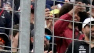 Checo Pérez sonríe luego de remontar 15 puestos en el Gran Premio de Canadá.