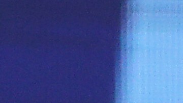 Nikola Jokic (L) durante un encuentro ante Miami Heat contra Jimmy Butler (R).