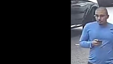 Es descrito como un hombre de 5 pies y 10 pulgadas, 200 libras con cabello negro corto y con antejos.