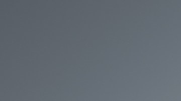 Light,Bulb,With,Wood,House,On,The,Table,,A,Symbol