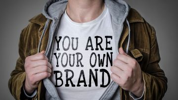 Man,Showing,You,Are,Your,Own,Brand,Tittle,On,T-shirt.