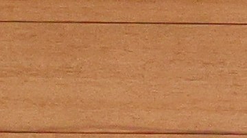 Un levantador de pesas iraní compite en los Juegos Olímpicos de Tokyo 2020.