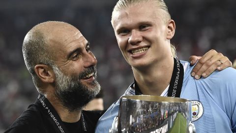 Pep Guardiola y Erling Haaland.