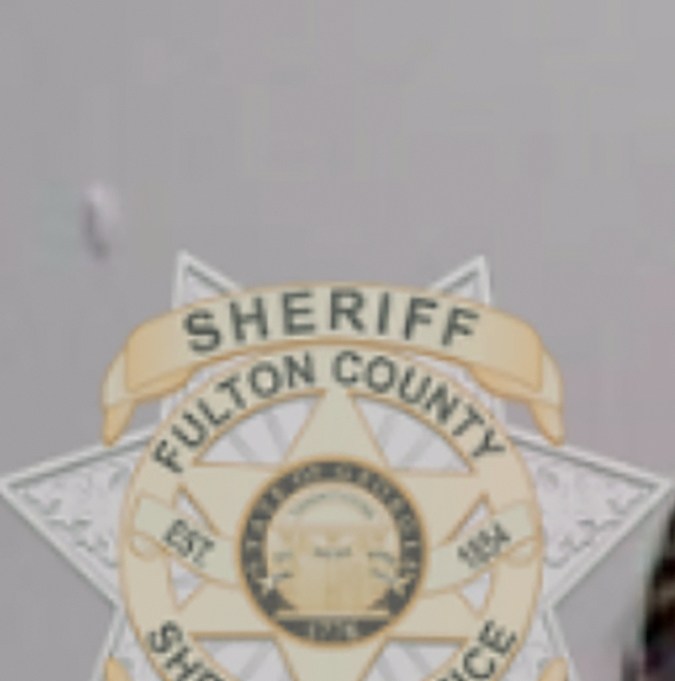 El pastor luterano Stephen Cliffgard Lee posa para la fotografía de su fichaje en la cárcel del condado de Fulton.