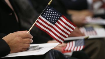 Immigrants Sworn In As American Citizens At Naturalization Ceremony