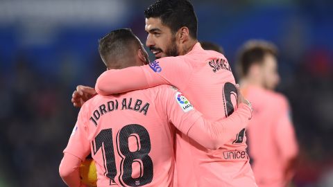 Jordi Alba y Luis Suárez.