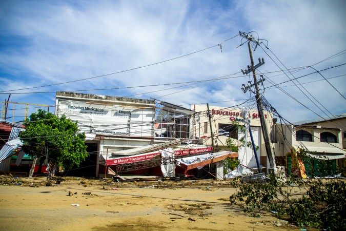 ACAPULCO, MEXICO - OCTOBER 26: A view of a store and a church damaged after hurricane Otis hit Acapulco on October 26, 2023 in Acapulco, Mexico. Otis made landfall through the coast of Acapulco in the early morning of October 25 as a category 5 storm. President Lopez Obrador reported that communications were interrupted in the city, power lines were down affecting almost a million people, infrastructure is severely damaged and the roads to the port present important damages. Authorities report 27 deceased and 4 people missing. (Photo by Oscar Guerrero Ramirez/Getty Images)