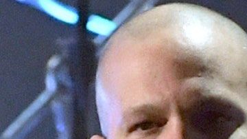 En la imagen aparecen Residente y Daddy Yankee.