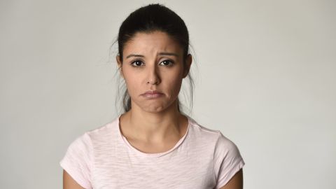Young,Beautiful,Hispanic,Sad,Woman,Serious,And,Concerned,Looking,Worried